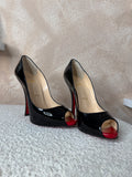 Louboutin Patent Pumps
